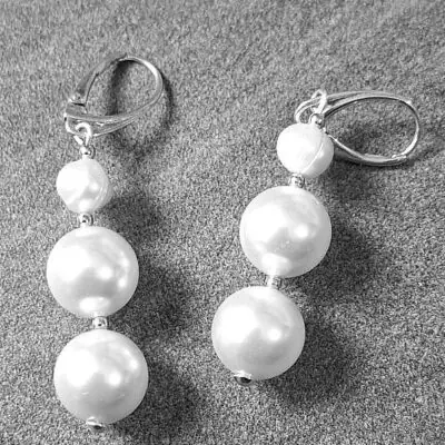 Naušnice s prirodnim biserom i biserom Swarovski u srebru 925